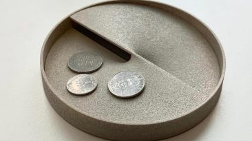 O conceito da bandeja de armazenamento em espiral mostra uma maneira minimalista de organizar pequenas coisas